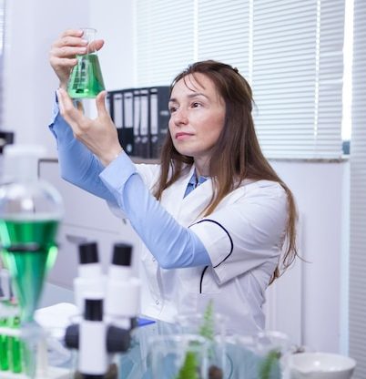 mature-female-scientist-making-scientific-test-her-research-lab-chemical-test-tubes_looking for distributors